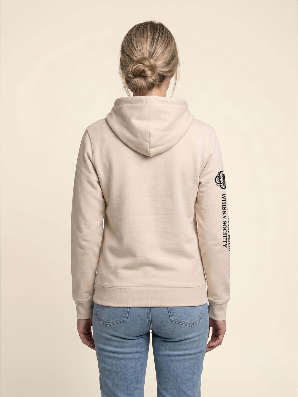 Back view of woman wearing ivory Signature Hoodie.