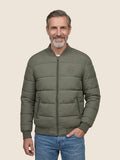 Man wearing a khaki Scottish Malt Whisky Society padded jacket with tone on tone logo on the left chest.