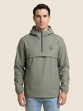 Man wearing a khaki Scottish Malt Whisky Society windbreaker jacket with tone on tone logo on the left chest.