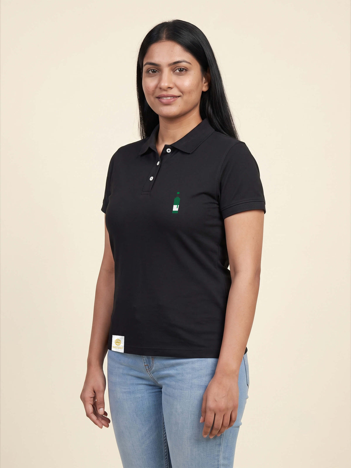 Woman wearing black Signature Fitted Polo with bottle printed on left chest matched to your favourite flavour profile
