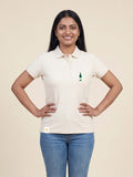 Woman wearing ivory Signature Fitted Polo with bottle printed on left chest matched to your favourite flavour profile