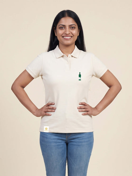 Woman wearing ivory Signature Fitted Polo with bottle printed on left chest matched to your favourite flavour profile
