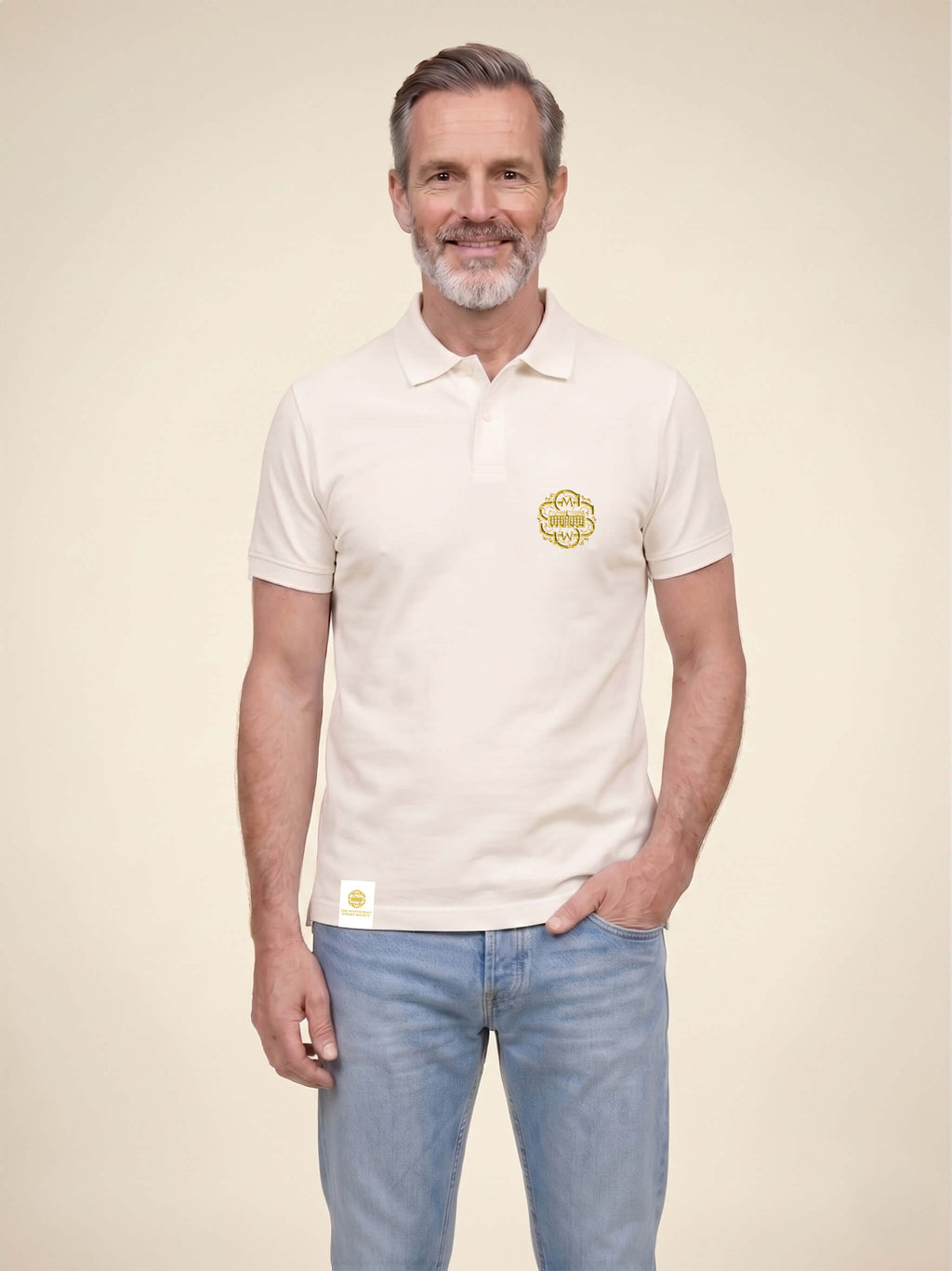 Man wearing a white Scottish Malt Whisky Society polo shirt with gold logo on the left chest.