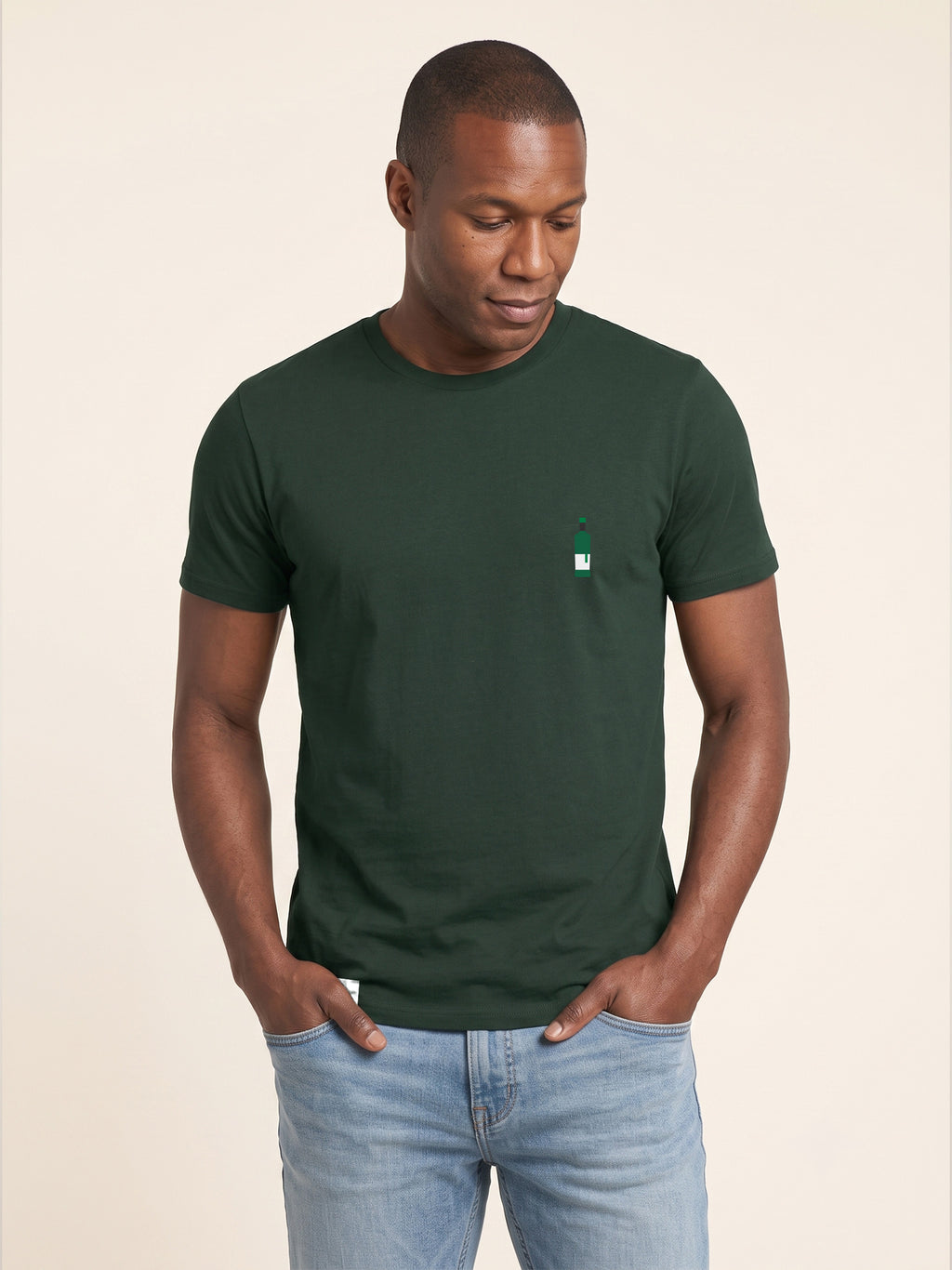 Front view of man wearing forest green Signature T-shirt with whisky bottle matched to your favourite flavour profile on left chest.