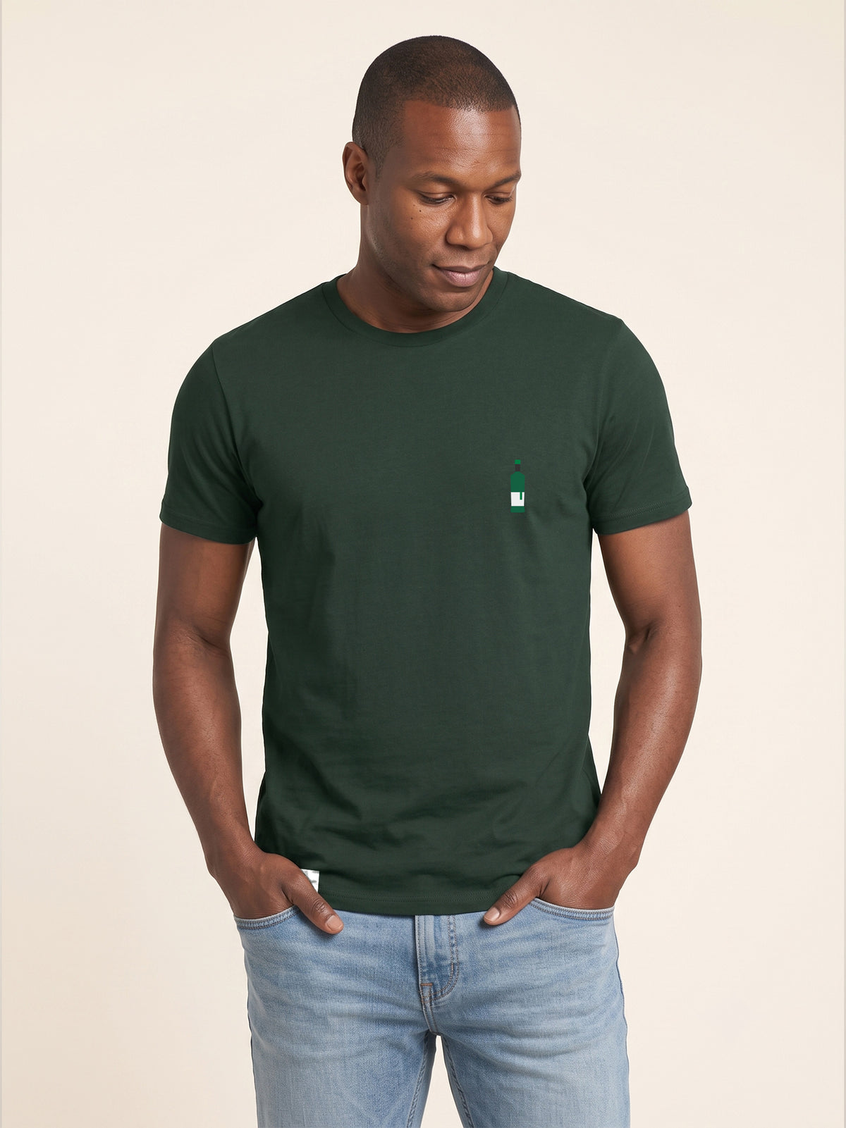 Front view of man wearing forest green Signature T-shirt with whisky bottle matched to your favourite flavour profile on left chest.