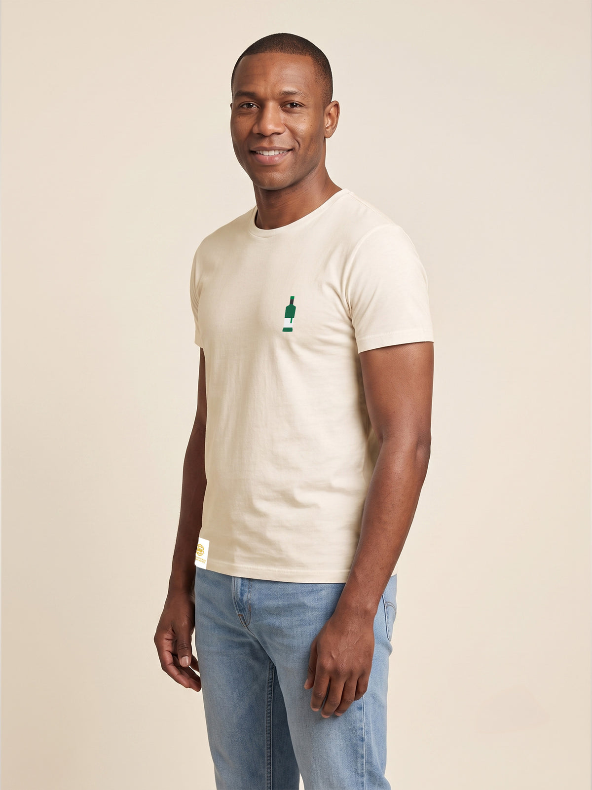 Side view of man wearing ivory Signature T-shirt with whisky bottle matched to your favourite flavour profile on left chest.
